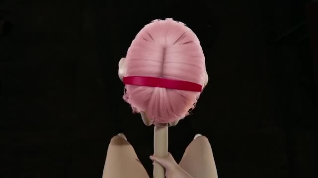 Sakura is licking the tip of it